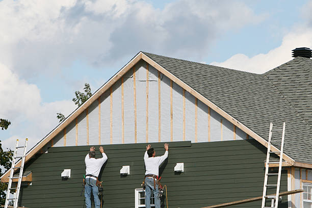 Professional Siding Repair technician working in Columbus, TX